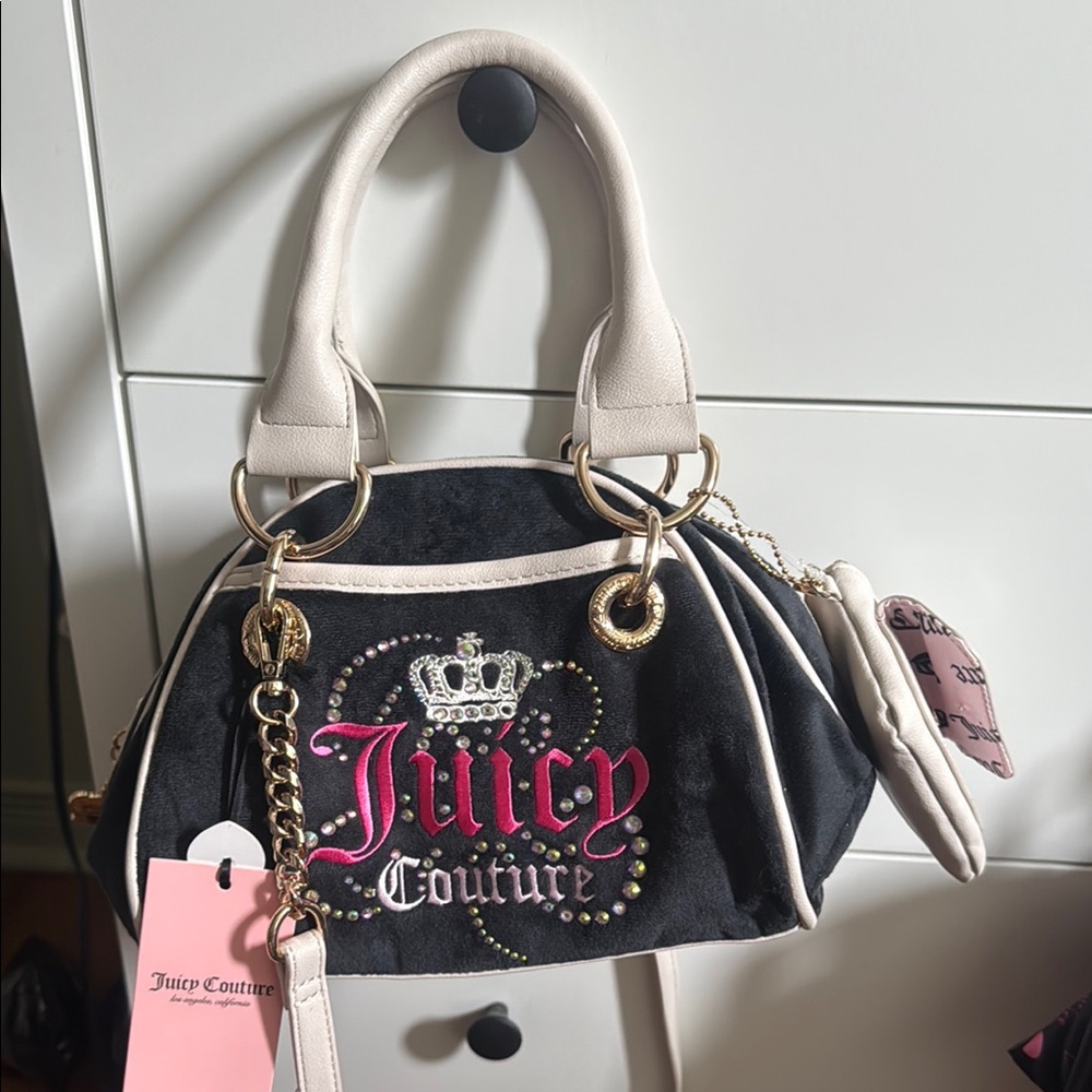 Juicy Couture Black and Cream Satchel with Elegant Branding